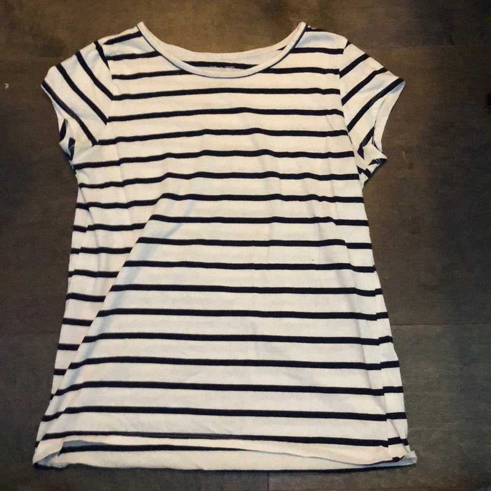 Striped white and navy blue kid shirt